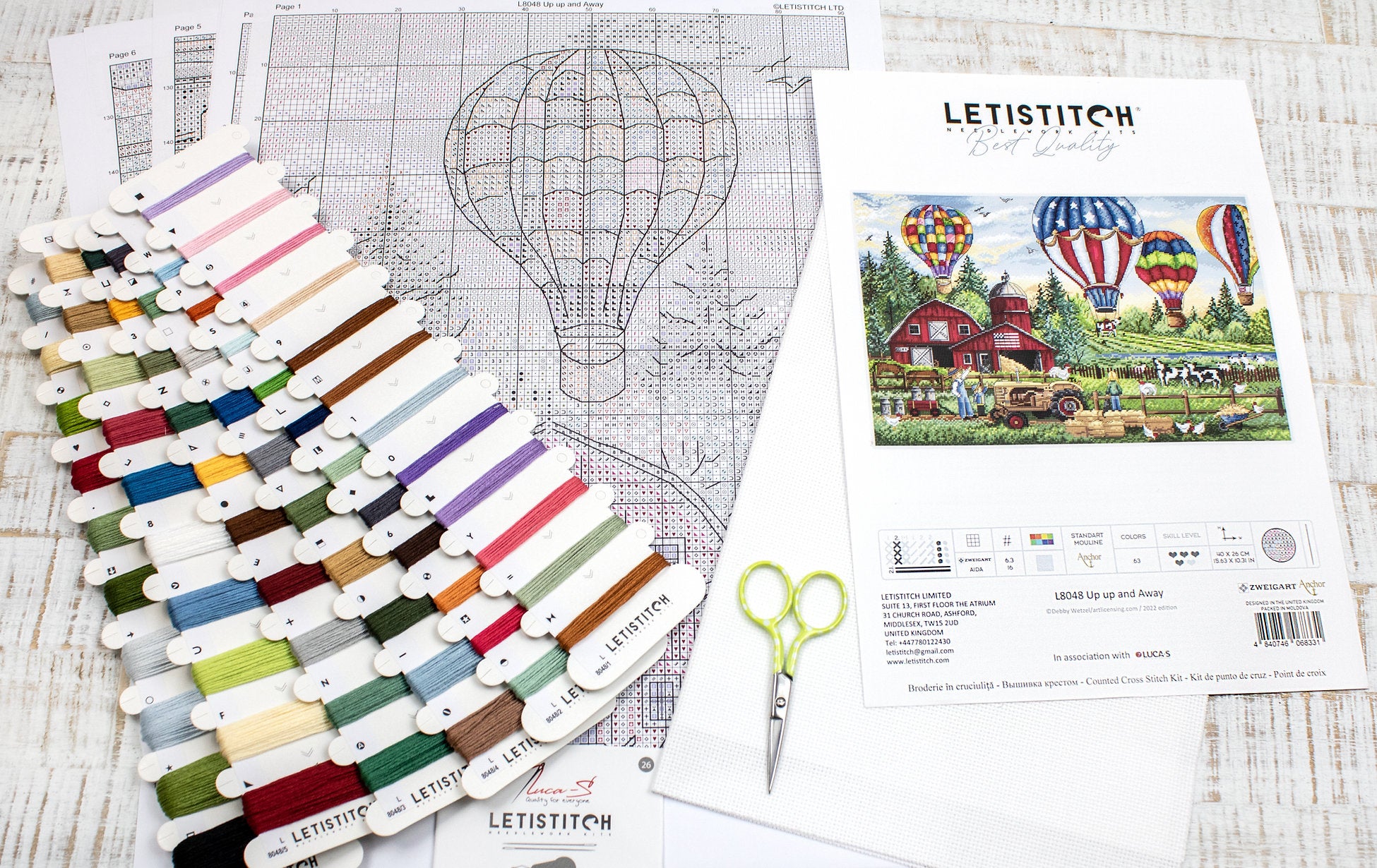 Up Up and Away L8048 Counted Cross Stitch Kit featuring colorful threads, Aida canvas, and detailed instruction chart.